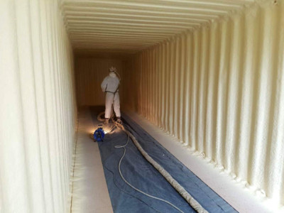 SPF Going in 1" closed cell spf being applied to entire interior of a shipping container
